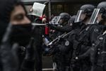 Portland police used tear gas and rubber bullets to disperse protesters from near the Justice Center an hour before the 8 p.m. curfew went into effect on May 30, 2020.
