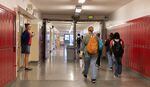 Students walk to class before the first bell rings at David Douglas High School in Portland on Sept. 6, 2023. For their first days of school, students were required to go through lessons on school procedures such as emergency exits and awareness of mental health resources the school offers.