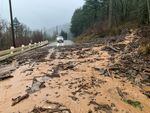 Flooding and debris on the Historic Columbia River Highway at Mosquito Springs Creek.  