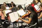 Ashley, a seventh-grader and student in OPB's Class of 2025 project, plays the violin in the school orchestra. With two orchestra classes, she plays her violin every school day.
