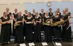 Members of the Elgin High School band pose for a photo prior to a district band competition in La Grande, Ore., in March 2022.