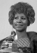 In this March 13, 1972 file photo, Aretha Franklin holds her Grammy Award for Best Rhythm and Blue performance of the song "Bridge Over Troubled Waters," in New York.