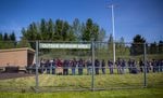 Women gather with tribal elders, prison staff and volunteers in the outdoor worship area for a spring celebration and first foods blessing at Coffee Creek Correctional Institute in Wilsonville, Ore., May 4, 2019.