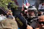 Proud Boy Alan Swinney fires paintballs at antifascist counter-protesters this summer. Fights between left- and right-wing protesters are now the norm in Portland. 
