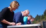 (Left to Right) NOAA Administrator Kathryn Sullivan, California Governor Jerry Brown, Interior Secretary Sally Jewell and Pacific Power CEO Stefan Bird sign two new Klamath Basin water deals on April 6, 2016.