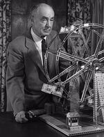 A.C. Glibert poses with his most lucratively successful invention, the erector set. 