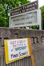 A sign leans against a wall outside Harriet Tubman Middle School May 13, 2022, when students marched from the North Portland school to the nearby Portland Public Schools administration building. The PPS board is scheduled May 24 to approve a district budget, which could lead to higher class sizes at the middle school level. 