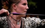 Katie Sterns of Arlington, Washington, has inspired a new generation to take up the ancient art of mounted archery. She pulls back her bow using her thumb and two fingers, a technique used by Mongolian mounted archers in ancient times.