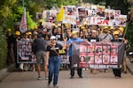 Residents, family members and friends of those killed or taken hostage gather to mark the one year anniversary of the attacks by Hamas, on October 7 in Be'eri, Israel.