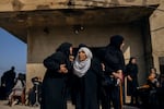 Relatives of Amal Hassan al-Durr grieve for her on Feb. 22 after she was killed during an Israeli attack the day before, in Majdal Zoun, Lebanon.