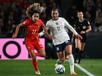 USA forward Sophia Smith (R) fights for the ball with Portugal midfielder Dolores Silva during the 2023 Women's World Cup match in Auckland, New Zealand on August 1, 2023.