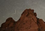 A meteor from the Tau Herculids meteor shower passes over Valley of Fire State Park in Nevada on May 30, 2022. A meteor shower known for producing fireballs, the Southern Taurids, is expected to peak this week.