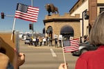 Demonstrators gather in Driggs, Idaho, to protest against President Trump and his administration.