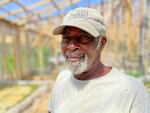 Phillip Barker, in the hydroponic growhouse on Olusanya Farm LLC, which he owns with his wife in Oxford, N.C.