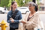 Linda Dean (right) and her friend talk after shopping at Hidden Worlds bookstore on Saturday, Sept. 19, 2026.