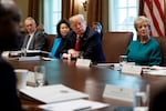 President Donald Trump participates in a cabinet meeting in 2018, during his first presidential term. At the time, Linda McMahon (right) was leading the U.S. Small Business Administration.