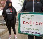 Kamelah Adams, left, at a protest led by Harriet Tubman Middle School students, May 13, 2022. Adams fears her Tubman eighth grader is not getting the education he needs to be prepared for high school.