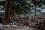 Debris lies along the Guadalupe River.