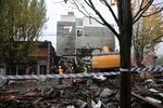 Construction workers cut a three-quarter-inch natural gas line outside a building Wednesday and gas collected inside. The ignition source inside the structure has yet to be determined.