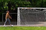 A person walks past a soccer area at Colonel Summers Park in Southeast Portland, April 21, 2025. The city website says the park received “several major improvements” in 2017. A new audit details facilities across Portland that are in need of repair.
