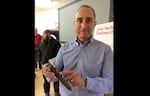 Jason Rea, chief engineer for the western region of Union Pacific Railroad, holds a lag screw, at least one of which is blamed for shearing off and causing the June 3 oil train derailment in Mosier.