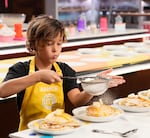 Asher Niles makes pancakes in the “Pancakes & Ice Cream” episode of this season's MasterChef Junior.