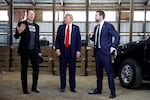 From left to right, Elon Musk, Republican presidential nominee Donald Trump and his running mate Sen. JD Vance talk to reporters back stage during a campaign rally on Oct. 05, 2024 in Butler, Pa.