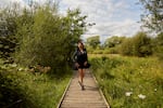 Three days before the start of the Miss Trans Global pageant, Chedino takes a break from sewing her national costume by going for a walk in the Riverside Nature Reserve in Guildford, U.K., on July 28, 2023.