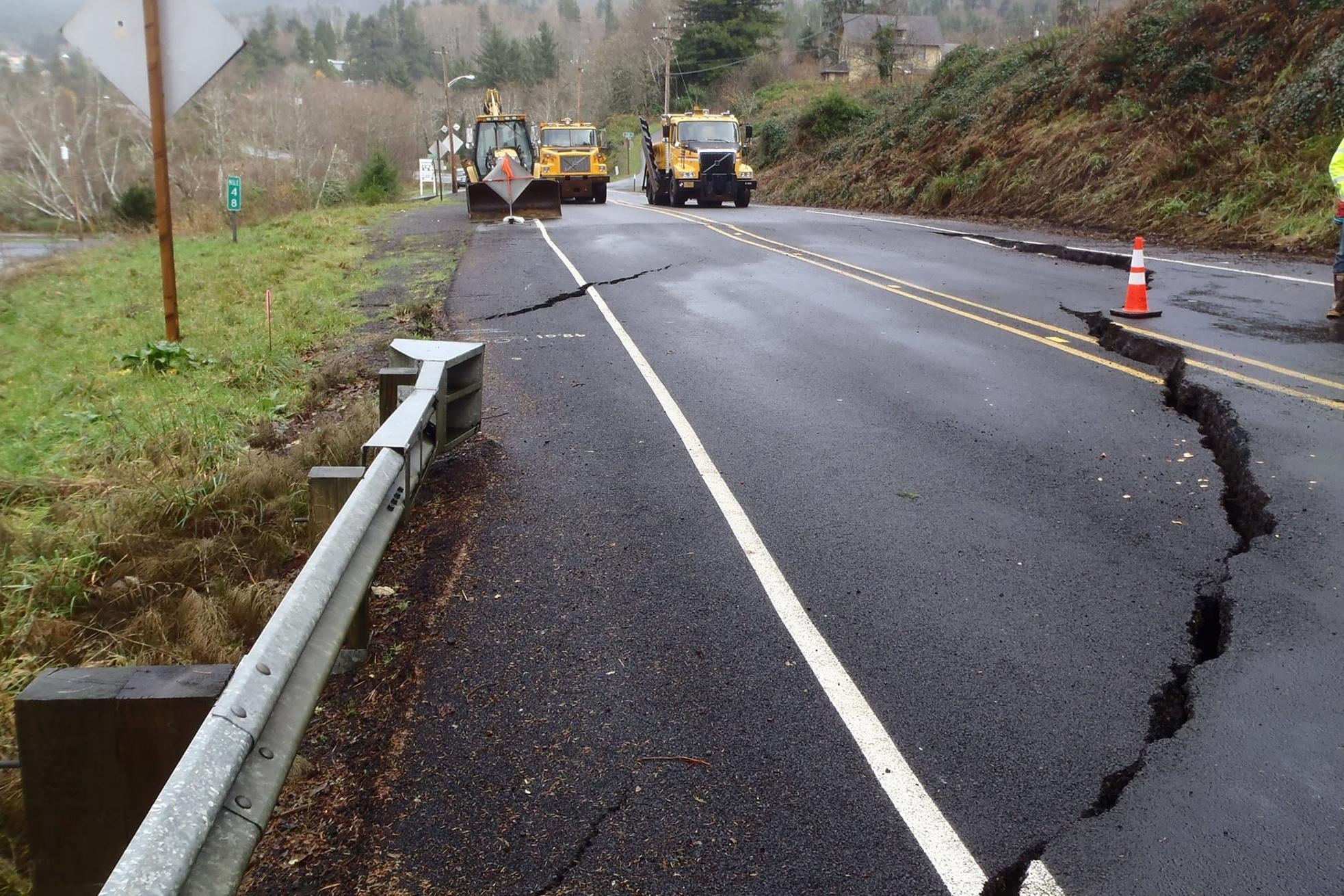 FILE-Highway 101 near Wheeler in Tillamook County, Ore., in 2015. The road was closed following heavy rains the week before which weakened the road's foundation, according to ODOT.