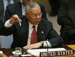 Then-U.S. Secretary of State Colin Powell holds up a vial that he said was the size that could be used to hold anthrax as he addresses the United Nations Security Council in February 2003 at the U.N. in New York.