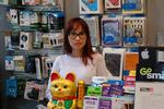 Heidi Huynh stands in her shop in Portland's Jade District on May 12, 2020. She's been helping some Vietnamese speaking customers navigate their unemployment applications in English.