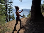 In this photograph released by the University of Idaho, study author Karen Heeter takes a core sample from an old mountain hemlock near Crater Lake, Oregon, where at least one tree dated to the 1300s.