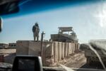 A soldier of the Free Syrian Army controls the departure of vehicles from the base towards Rukban refugee camp located at the edge with the Jordanian border in Al Tanf, Syria. December 14, 2024.