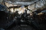 Ukrainian servicemen of 148th separate artillery brigade of the Air Assault Forces fire towards Russian positions by a M777 howitzer at the frontline in Donetsk region, Ukraine, Wednesday, August 21, 2024.