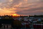 The sun over firefighter camp at the Sisters Rodeo ground in Sisters, Ore., Thursday, Aug. 28, 2025.
