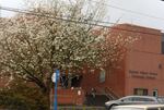 A student enters Beverly Cleary school in Portland, Ore., April 4, 2013.