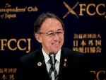 Okinawa Governor Denny Tamaki smiles during a press conference in Tokyo on March 1, 2019, after a vote on the relocation of a U.S. base on the island on Feb. 25.