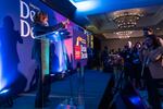 Vice President Kamala Harris makes the thumbs up sign as she is applauded as she arrives in a surprise appearance to speak to the Indian American Impact Project's Annual Summit on May 15, 2024 in Washington.