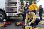 Firefighters at Redmond Fire District receive training on wildland fire equipment. Fire Chief Pat Dale said they've seen fewer applicants for open positions, compared to previous years.