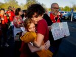 Hollis Moore, a 30-year-old teacher in the Kirkwood School District in Kirkwood, Mo., hugs their student Maggie McCoy, 10, on April 17, 2023, before a school board meeting outside the North Kirkwood Middle School. Moore alleges they have been discriminated against by district officials due to their gender identity. Full story here.