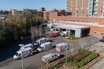 Ambulances stack up outside the emergency department, waiting for patients to be admitted at Salem Health in Salem, Oregon, Jan. 27, 2022. 
