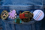 Pins on Kevin Wren’s jacket include an #insulin4all pin, pictured on Monday, Sept. 28, 2026, in Seattle, Wash.