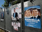 Posters with images or names of local candidates for the first round of the 2024 French legislative elections displayed in front of the local town hall in Port-en-Bessin-Huppain, Normandy, France, on June 25. France will hold an early legislative election in two rounds, on June 30 and July 7.