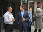 Republican gubernatorial candidate Knute Buehler (center, blue suit) speaks with supporters and students outside Davis Elementary School in Gresham on June 28, 2018.