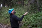 Lieberg points out areas that could benefit from a controlled burn.