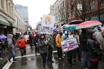 Demonstrators march through the rain at Women's March on Portland on Saturday, Jan. 21, 2017.