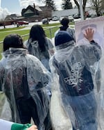 Roughly 40 students participate in a school walkout on March 4, 2025, in Woodburn, Ore. The protest was in response to the Woodburn School Board the week prior voting down a 'Safe and Welcoming Schools' resolution reaffirming the rights of immigrant students. The board revisited and passed the resolution on March 11.