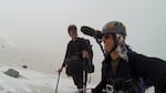 Producer Ed Jahn and Senior Videographer Todd Sonflieth filming Mt St. Helens Glacier Caves in treacherous conditions