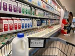Grocery prices fell in April as overall inflation cooled. Milk prices dropped 0.8% while egg prices declined 7.3%.