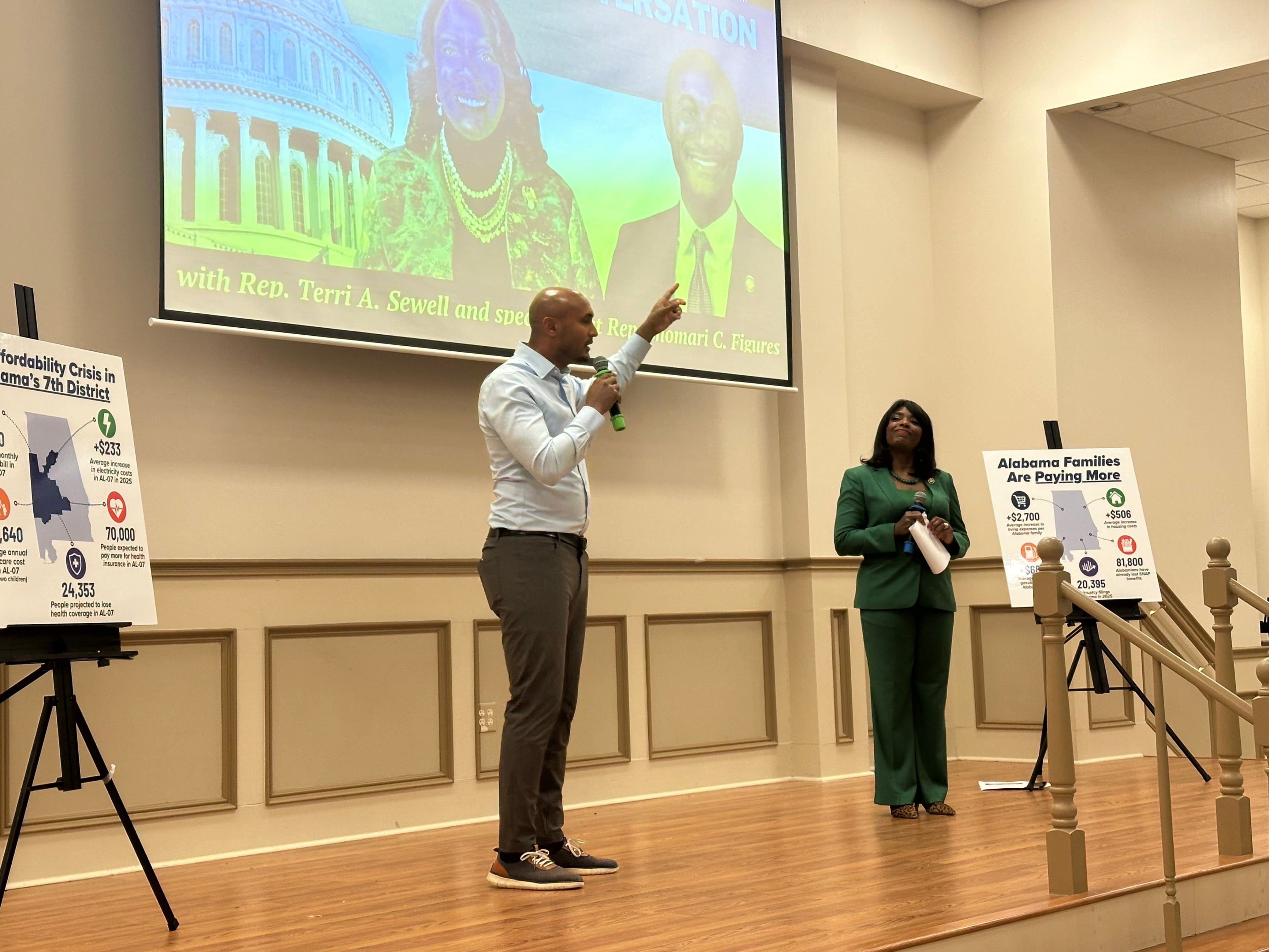 Democratic Reps. Shomari Figures, left, and Terri Sewell host a community event for voters at the Beulah Primitive Baptist Church in Lowndes County, Ala., on July 30.